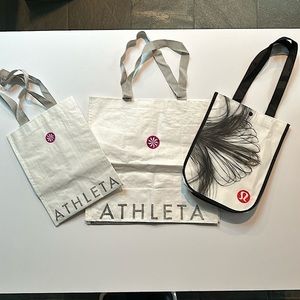 Lot of three reusable bags two Athleta and one Lululemon